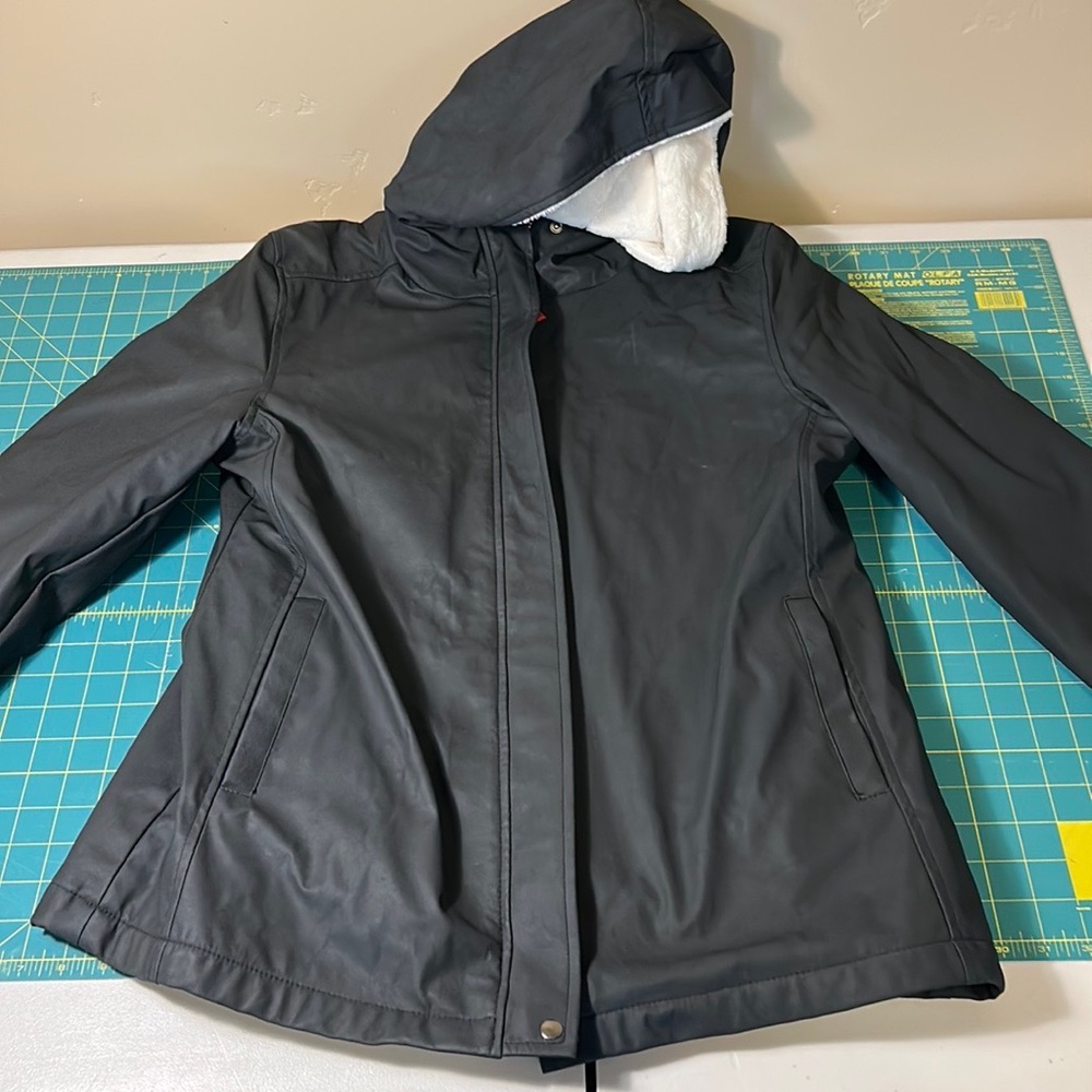 Cozy women’s insulated hooded mid length rain coat - Large
